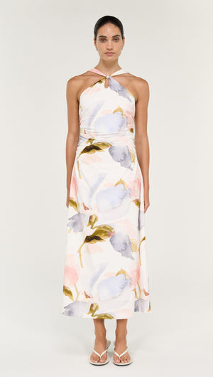Pastel Watercolour Cotton Midi Dress with Halter Neck displayed on a model, showcasing its flowy silhouette and soft colors.