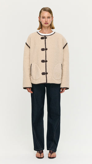 Brown Contrast Trim Duffle Coat in Teddy worn by a model, featuring a cozy textured fabric and stylish buttons.