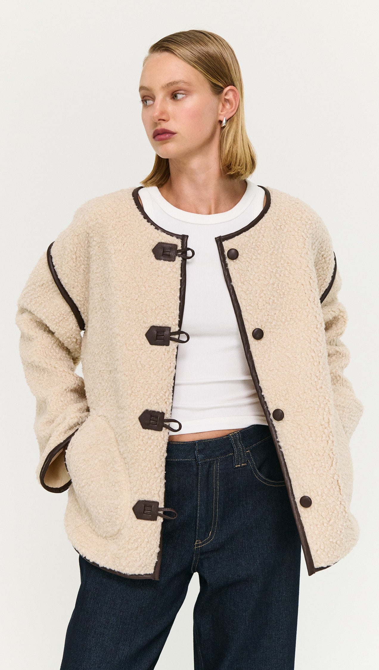 Brown Contrast Trim Duffle Coat in Teddy worn by a model, featuring a soft, cozy design with stylish button details.