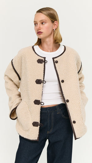 Brown Contrast Trim Duffle Coat in Teddy worn by a model, showcasing cozy winter fashion.