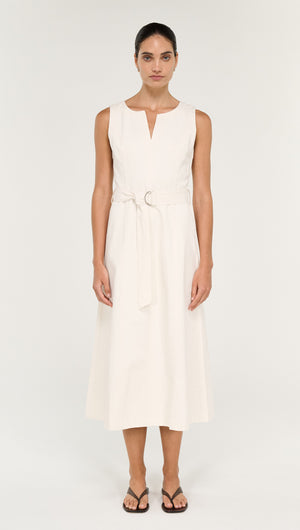Model wearing a Cotton Belted Wrap Midi Dress in Cream with a fitted bodice and belted waist.