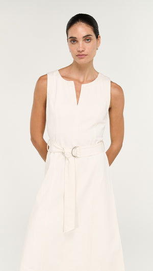 Cotton Belted Wrap Midi Dress in Cream worn by a model, showcasing its elegant design and belted waist.