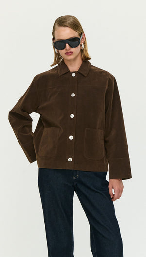 Chocolate Brown Faux Suede Barn Jacket worn by a model, showcasing the relaxed fit and button front design.