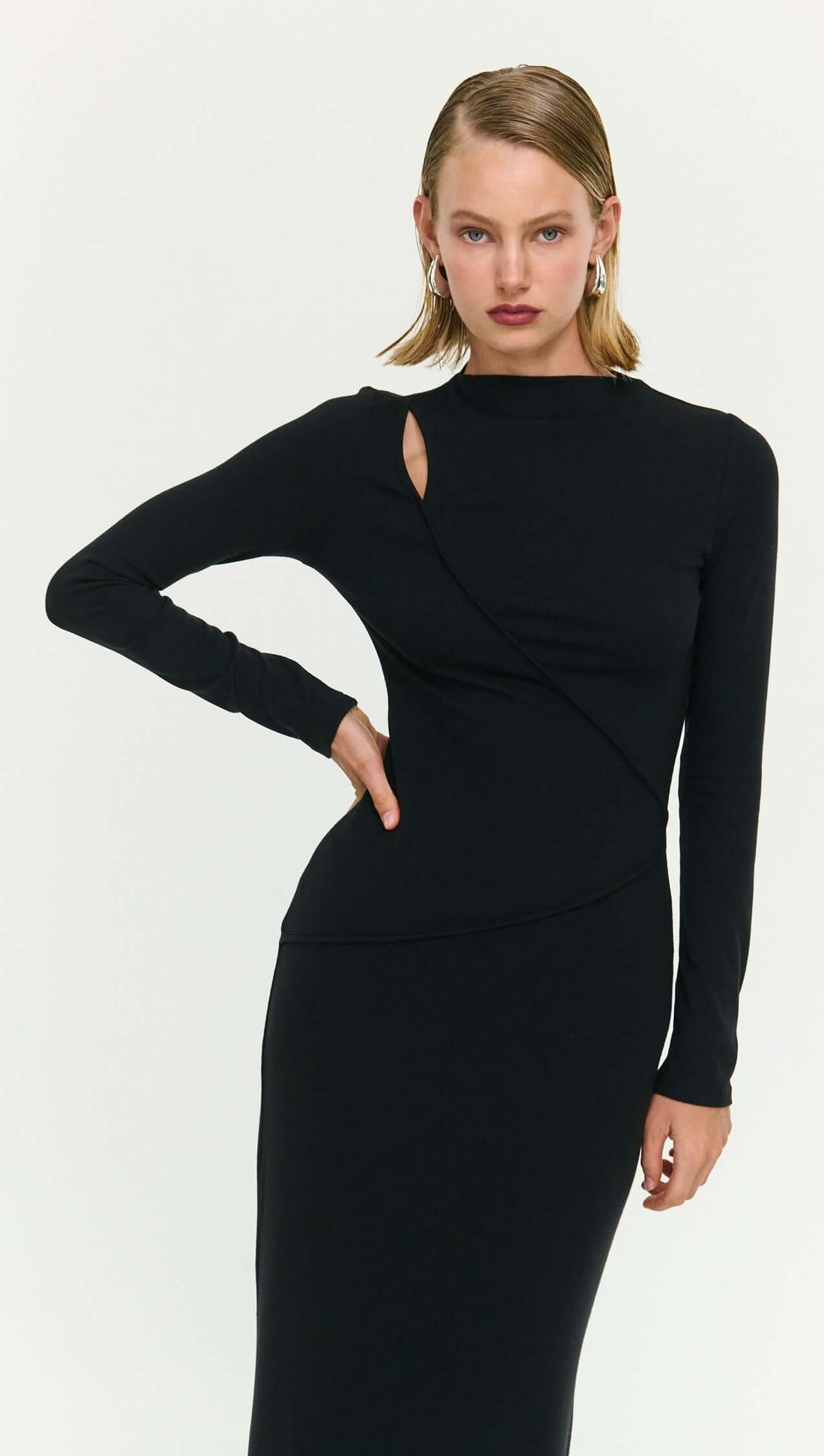 black dress lines THE CURVE BETWEEN THE LINES DRESS IN BLACK  THE OWN STUDIO