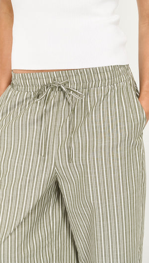 Khaki Stripe Relaxed Cotton Pant featuring an elastic waistband and side pockets, perfect for warm-weather dressing.
