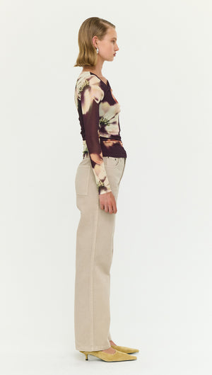 Model wearing Stone Wash Straight Leg Jeans in a side view, showcasing a modern and stylish fit.