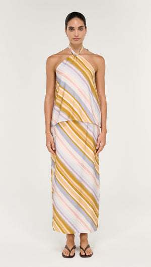 Fashion model wearing a Pastel Stripe Mid Rise Midi Skirt with matching top, showcasing fluid movement and soft color.