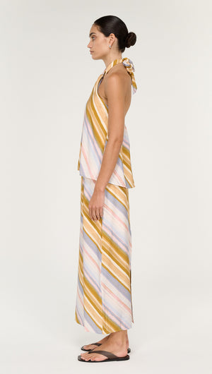 Model showcasing the Pastel Stripe Mid Rise Midi Skirt with a sleeveless top, displaying soft colors and fluid movement.