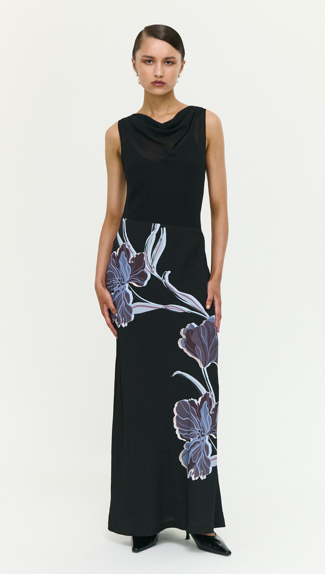 Blue Floral Bias Cut Combo Midi Dress worn by model, featuring stylish floral design on a black background.
