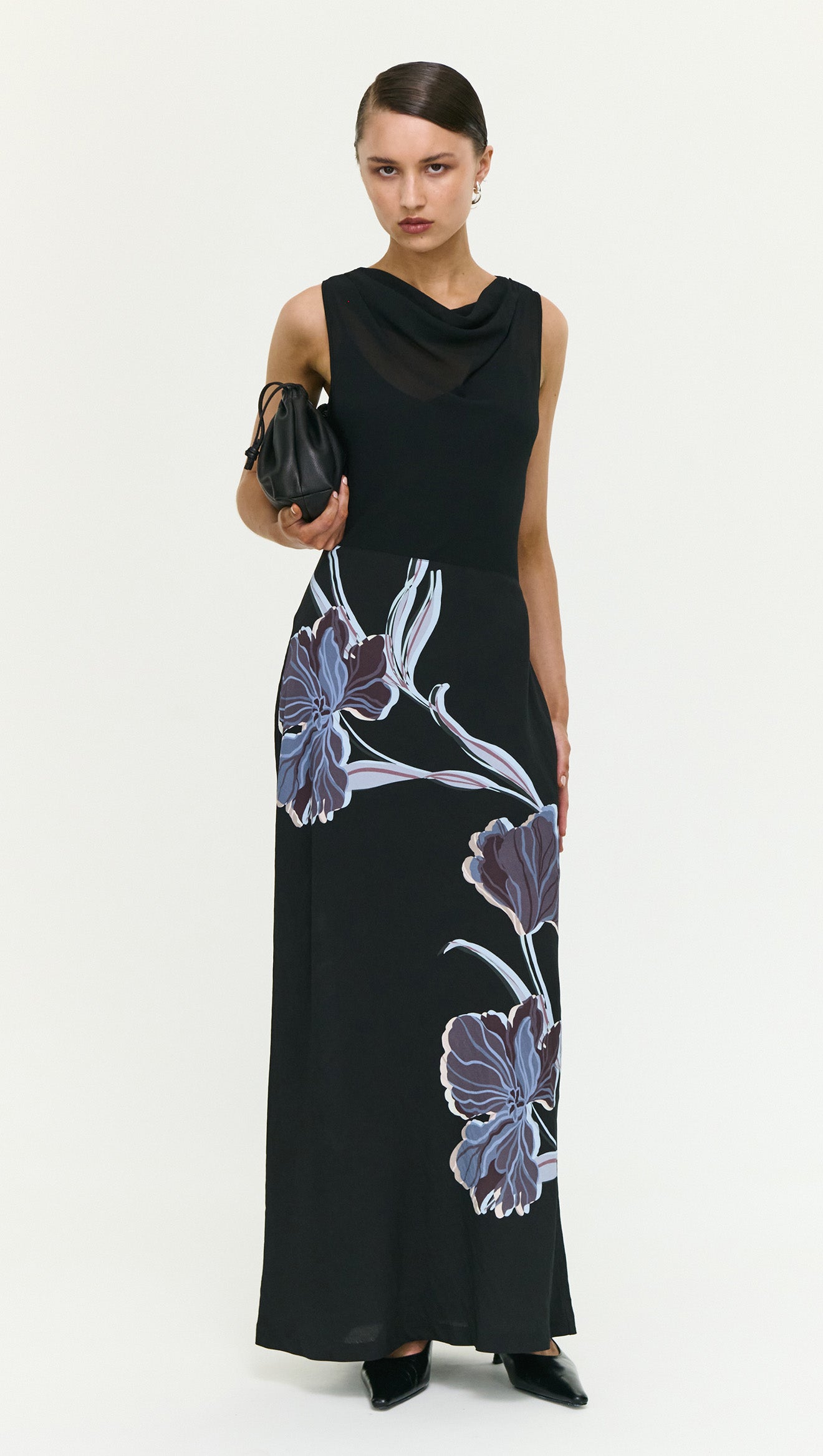 Blue Floral Bias Cut Combo Midi Dress worn by model, featuring stylish floral design on a black background.