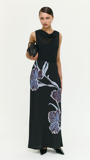 Blue Floral Bias Cut Combo Midi Dress worn by model, featuring stylish floral design on a black background.