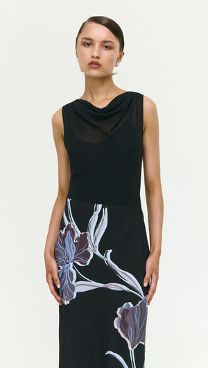 Model wearing the Blue Floral Bias Cut Combo Midi Dress, showcasing floral design and elegant fit.