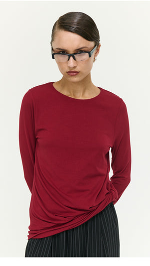 Long Sleeve Jersey Twist Top in Merlot, featuring a stylish twist design and soft stretch fabric, perfect for layering.