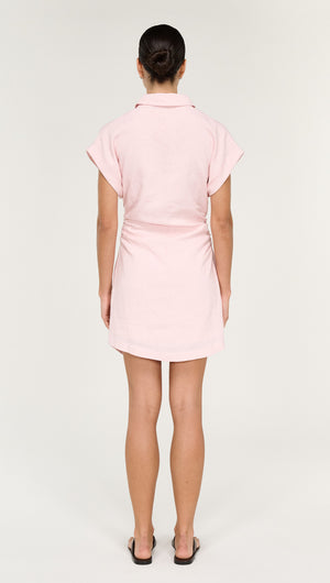 Back view of Collared Mini Dress in Soft Pink, showcasing a stylish and feminine look.