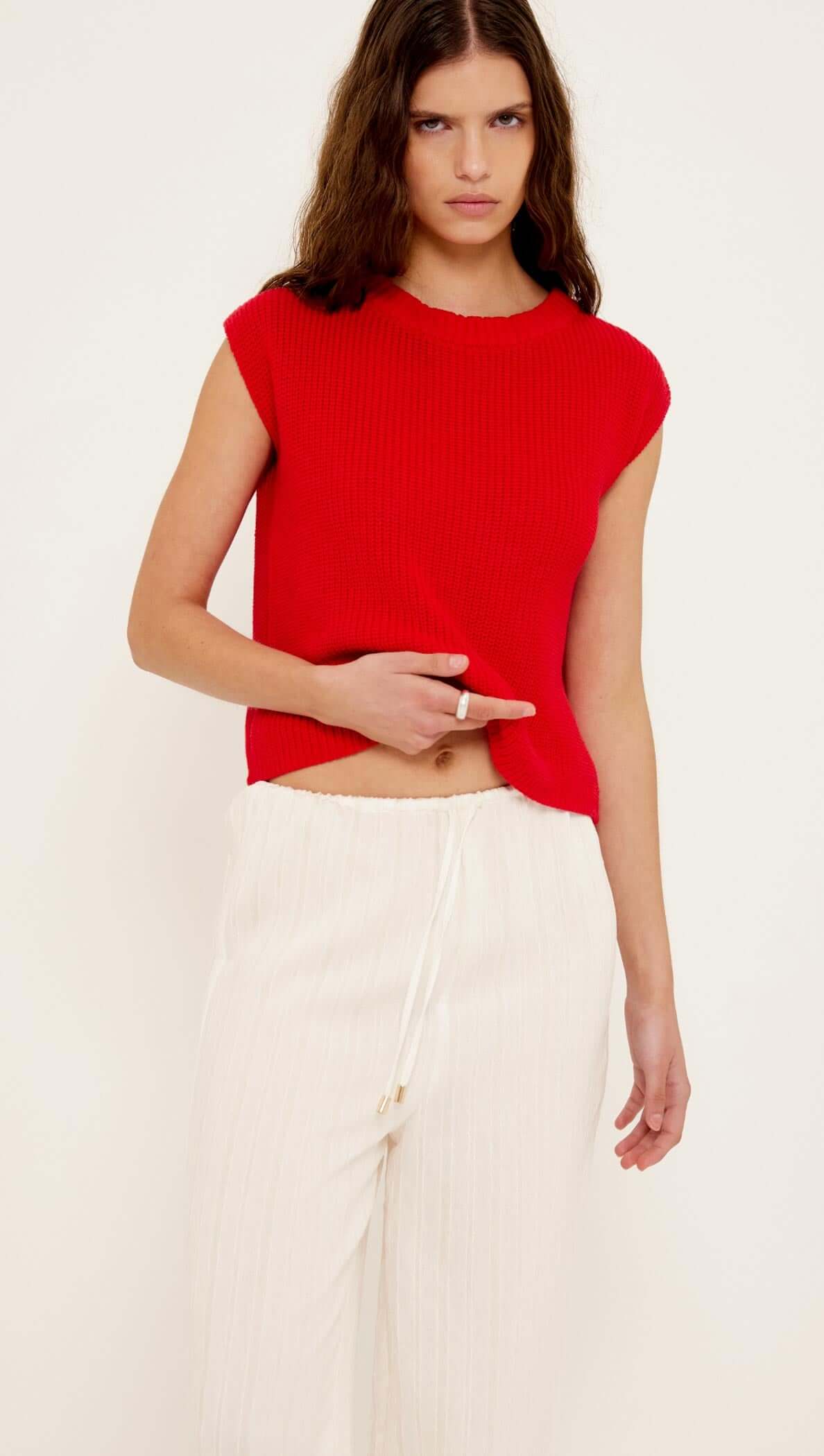 Model wearing a red top with the White Wide Leg Drawstring Pants, showcasing relaxed sophistication and casual style.