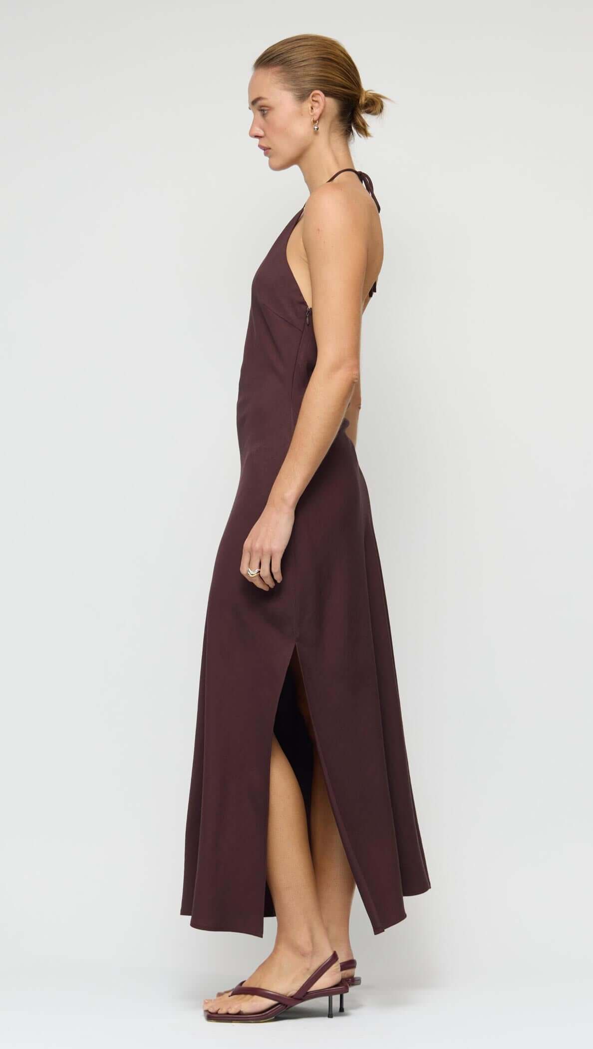 Chocolate Halter Midi Dress side view showcasing halter neckline and side split detail.