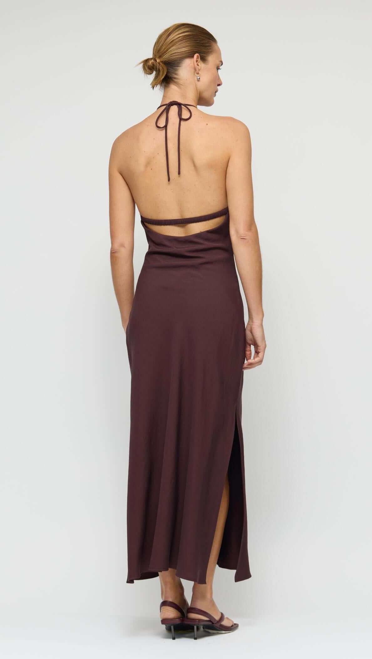 Chocolate Halter Midi Dress showcasing open back detail and side split hem.