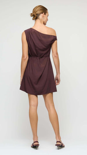 Linen Blend Chocolate Asymmetrical Mini Dress showcased from the back with a one-shoulder design and relaxed A-line silhouette.