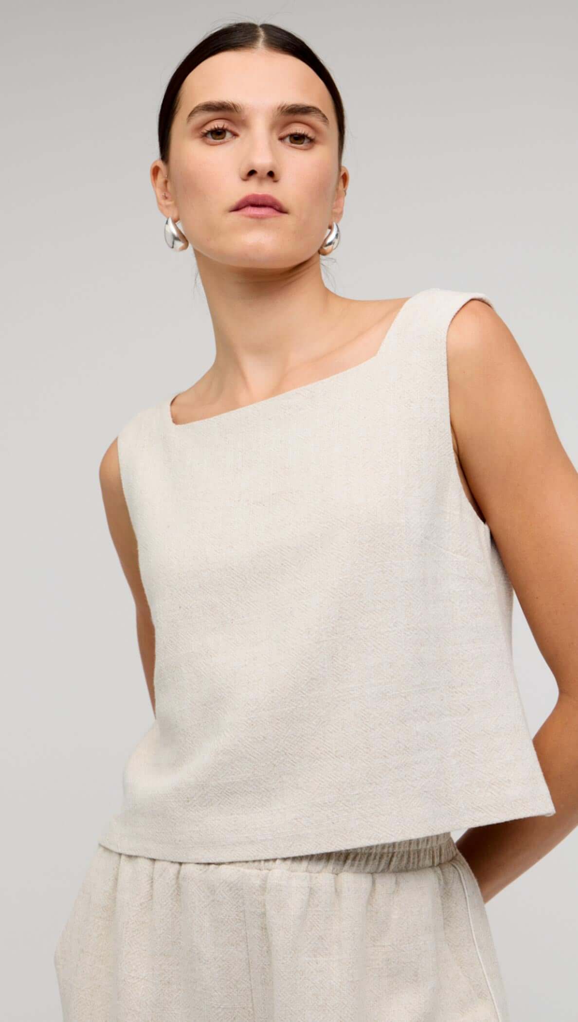 Natural Marle V-Back Linen Top styled with a square neckline on a model, perfect for summer outfits.