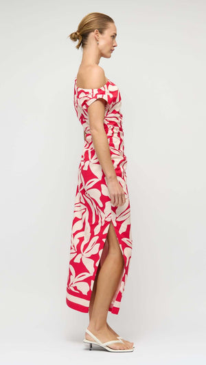Cotton Blend Red & White Floral Asymmetrical Midi Dress showcased on a model, featuring a side view of its elegant design.