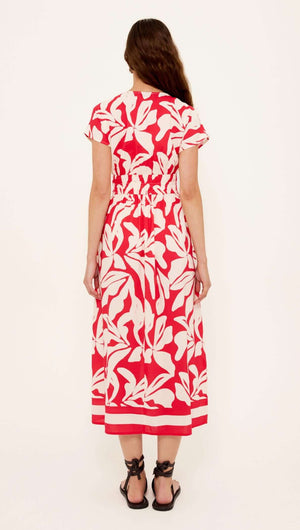 Cotton Blend Red & White Floral Print Shirred Midi Dress, featuring a stylish shirred waist and bold floral print from the back view.