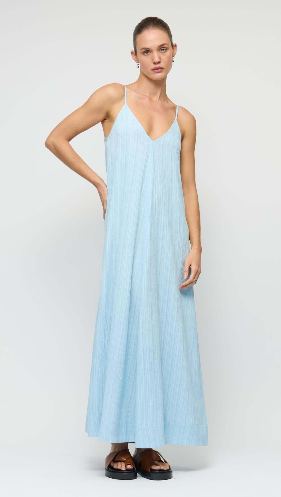 Sky Blue Crepe V-Neck Floaty Maxi Dress featuring a relaxed silhouette and slim adjustable straps.