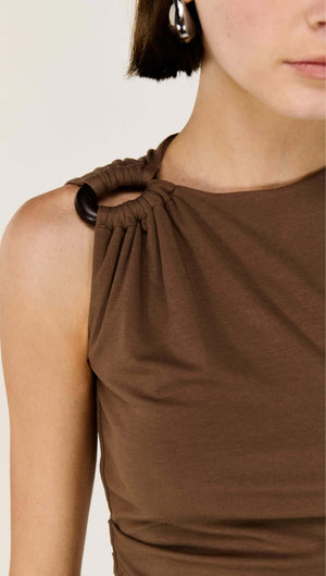 Close-up of the Brown Ruched Slinky Tank showcasing soft ruching and statement hardware shoulder detail.