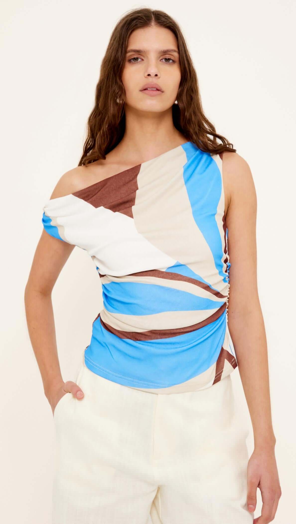 Blue Abstract Asymmetric Mesh Top showcasing a stylish asymmetric neckline and ruched detailing in bold colors.