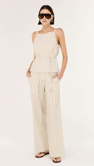 Model wearing the Cotton Blend Stripe Tie Waist Top with wide-leg striped pants, featuring an adjustable tie and sunglasses.