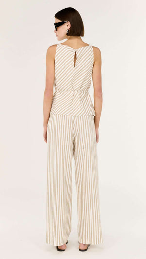 Cotton Blend Stripe Tie Waist Top model wearing a sleeveless striped top with tie waist and wide-leg pants.