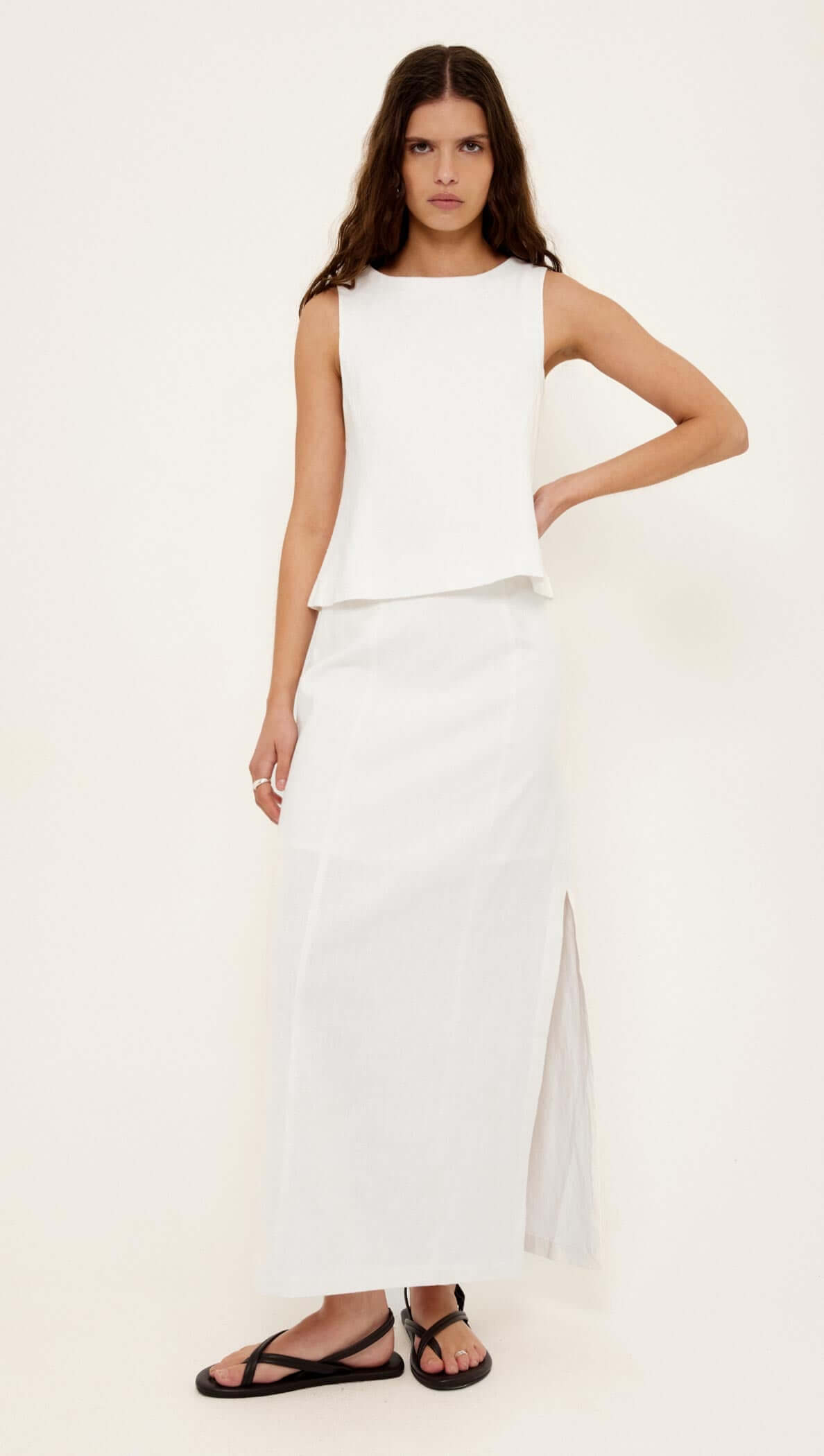Linen Cotton Blend White Midi Skirt showcased on model, featuring side split, clean waistband, and casual elegance.