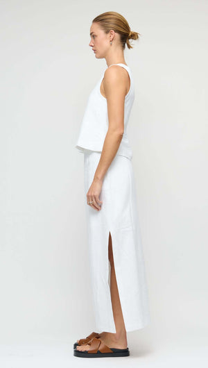 Linen Cotton Blend White Midi Skirt styled with a matching top, showcasing its elegant side split and streamlined design.