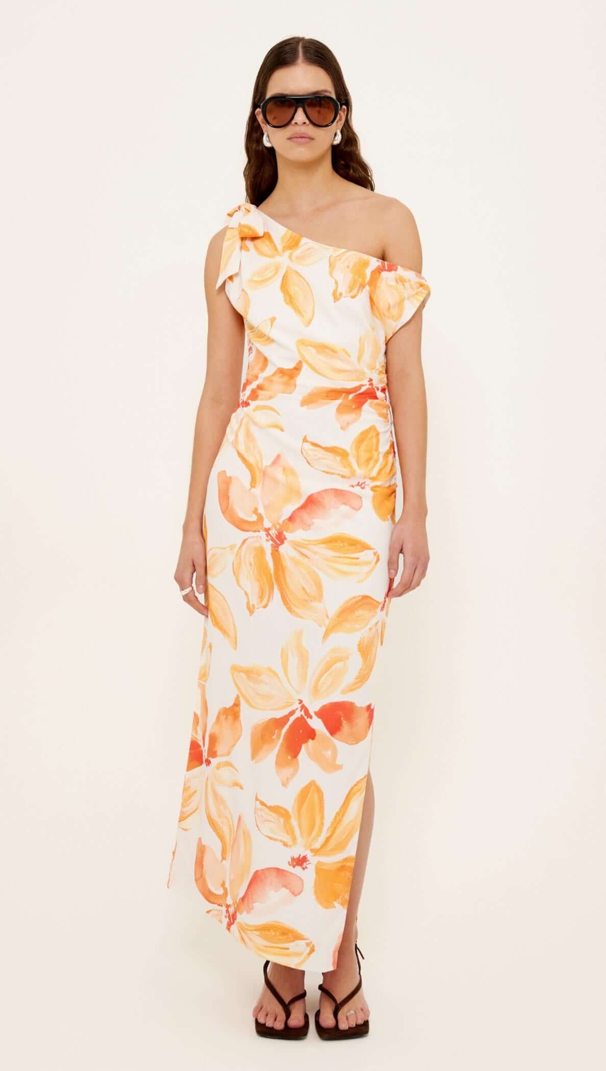 Orange & White Floral Asymmetric Midi Dress featuring a one-shoulder design and vibrant floral print.
