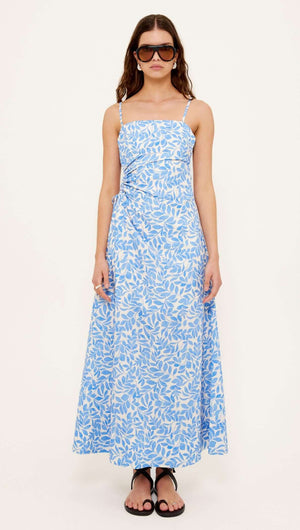 Cotton Blue Leaf Print Cut Out Maxi Dress featuring a ruched waist and side cut-out detailing, perfect for warm weather.