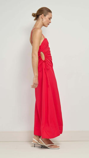 Red Linen Blend Cut-Out Maxi Dress featuring a side view of a model wearing a ruched design and waist cut-out.