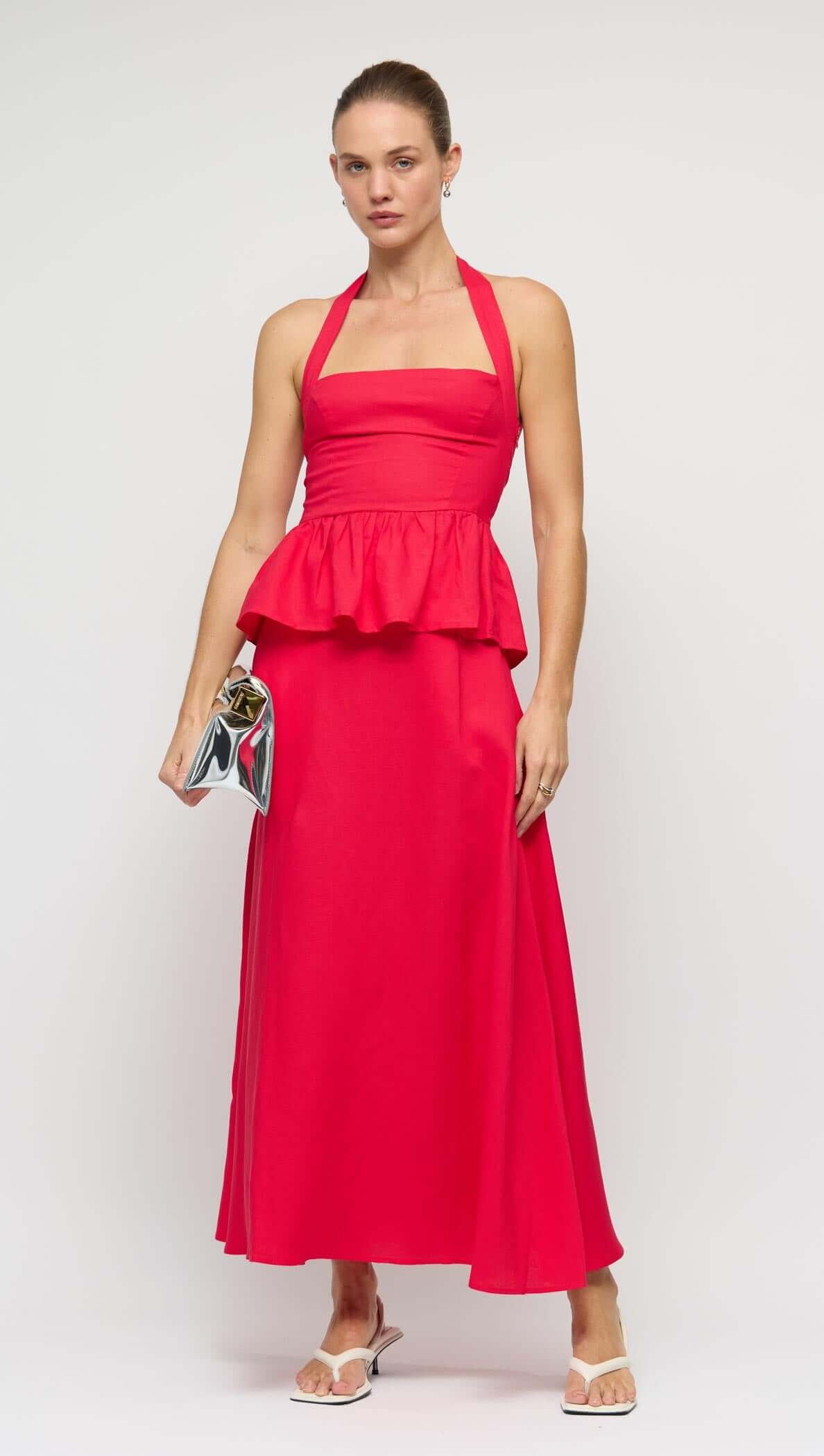 Red Linen Blend Maxi Skirt styled with a peplum top, showcasing a fashionable high-waisted silhouette.