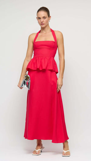 Red Linen Blend Maxi Skirt styled with a peplum top, showcasing a fashionable high-waisted silhouette.