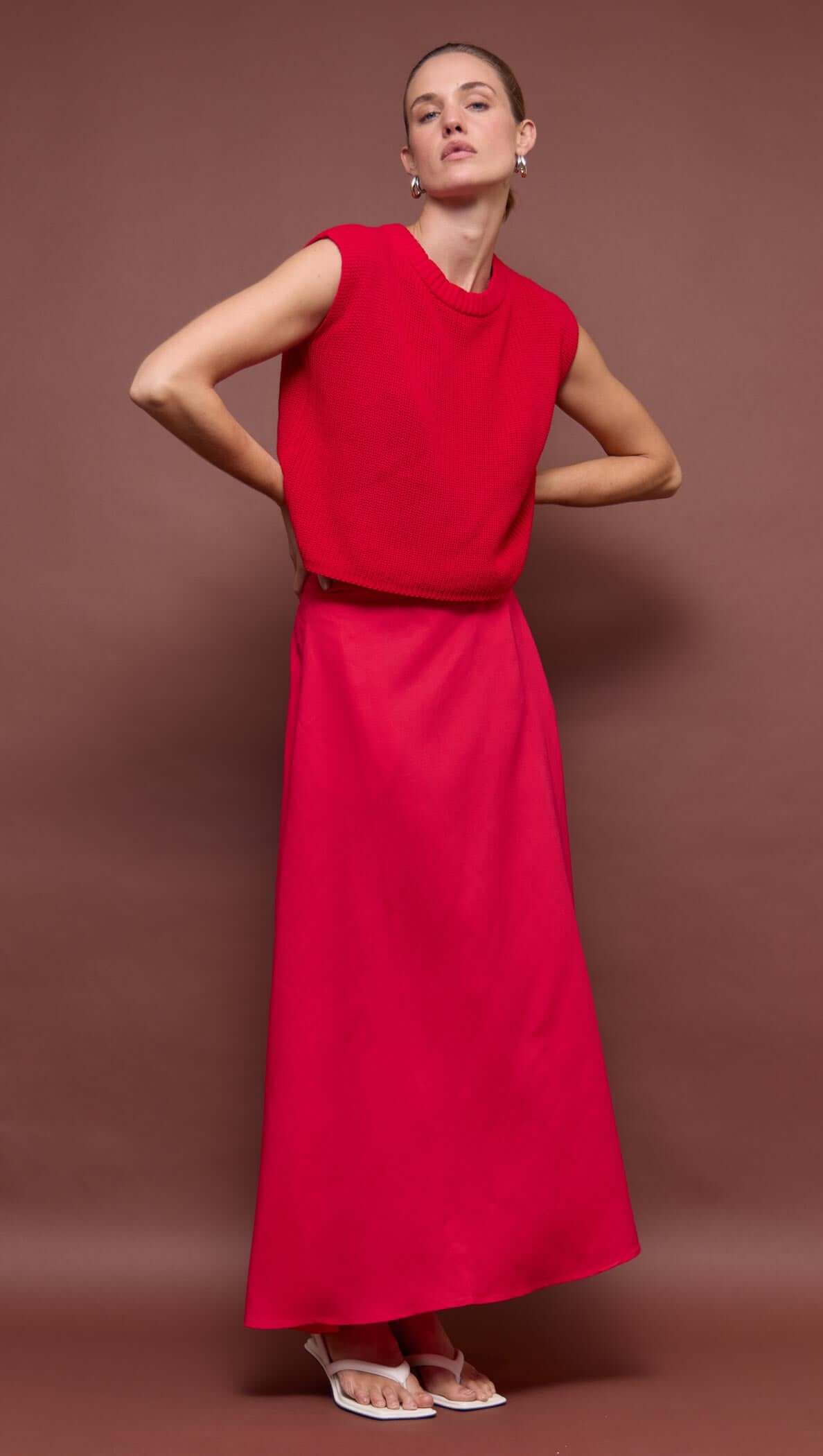 Red Linen Blend Maxi Skirt worn with a matching top, featuring a high-waisted fit and full-length hemline.