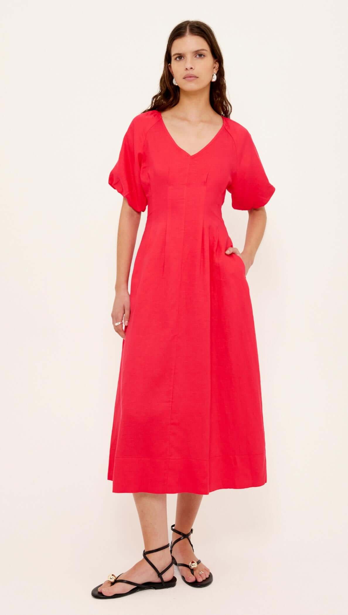 Red Linen Blend v-Neck Midi Dress on model showcasing its flattering design and short puff sleeves.