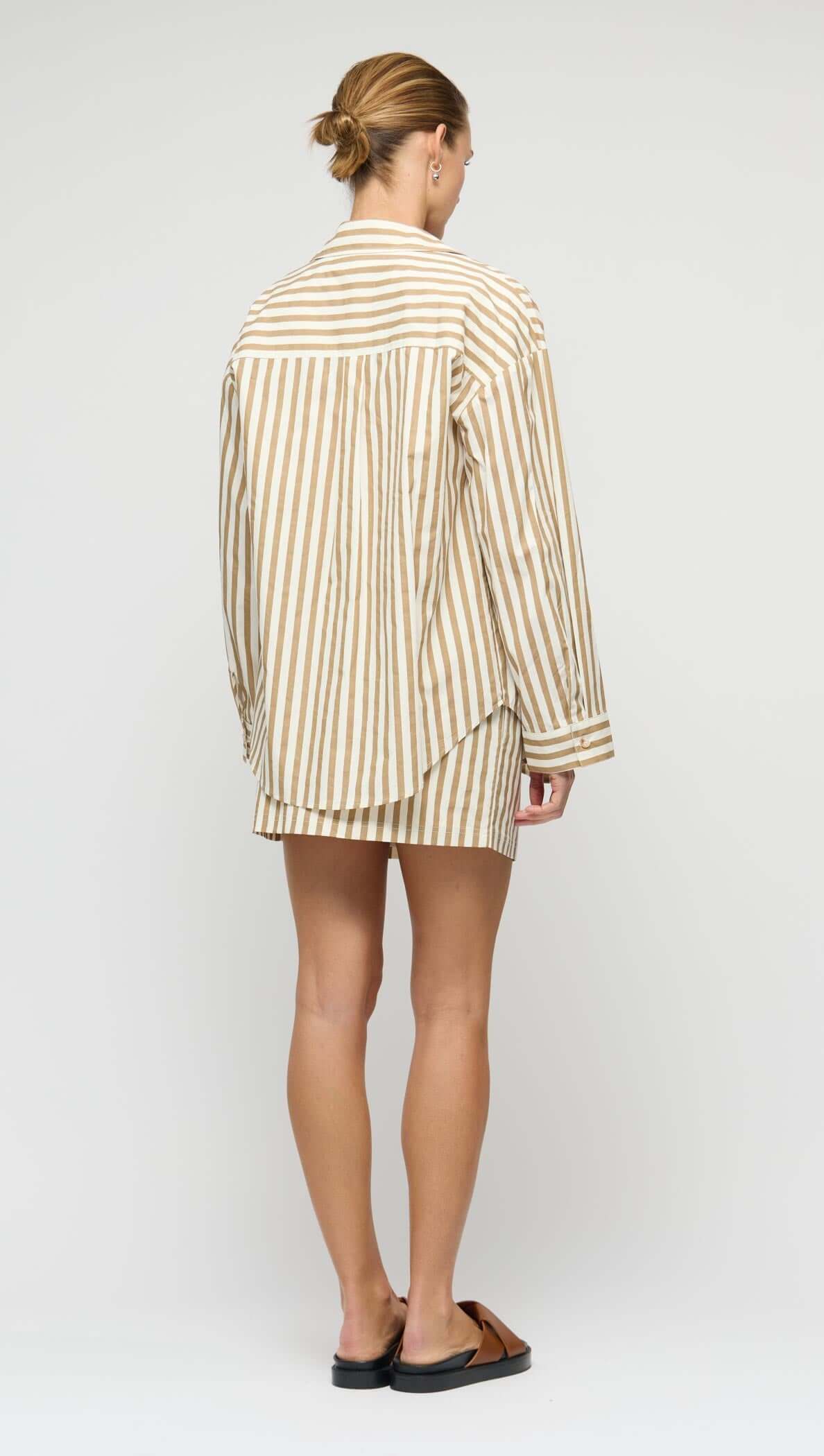 Cotton Oversized Stripe Shirt displayed from the back view, showcasing its relaxed fit and timeless striped design.