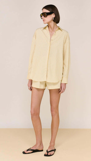 Butter Yellow Striped Shirt worn with matching shorts for a casual, stylish look in a relaxed fit.