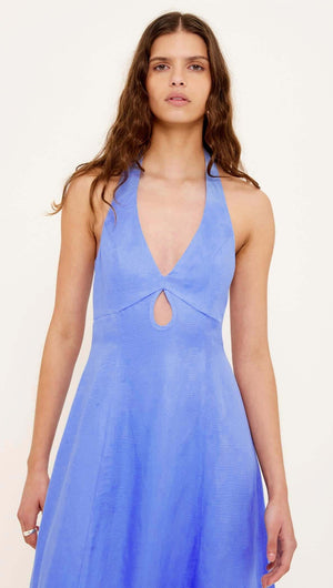 A model wearing the Jacaranda Tencel Linen Blend Halter Midi Dress with a halter neckline and keyhole detail.