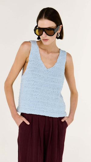 Model wearing the Baby Blue Cotton Knit Tank with oversized sunglasses and relaxed fit pants.