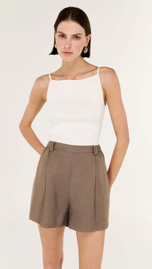Brown Linen Blend High Waisted Shorts paired with a white tank top, showcasing a stylish summer look.