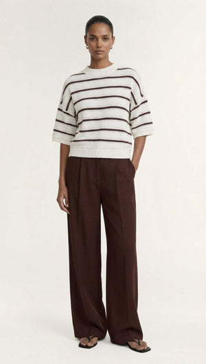 Brown Stripe Cotton Blend Crew Knit Tee worn with wide-leg brown pants, showcasing stylish and relaxed layering.