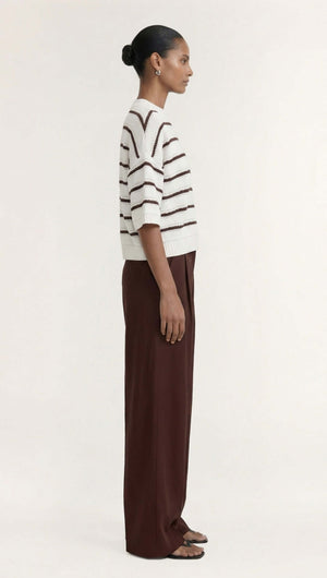 Brown Stripe Cotton Blend Crew Knit Tee styled with relaxed fit and elbow-length sleeves, shown in a side view.