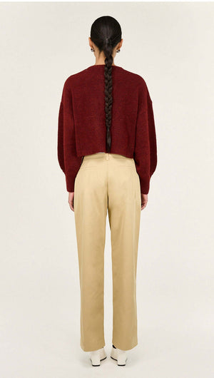 Burgundy Cropped Knit Cardigan displayed from the back, showcasing its cropped length and balloon sleeves.