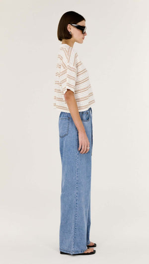 Model showcasing Chambray Lightweight Elasticated Denim Pants with a relaxed fit and elasticated waistband.