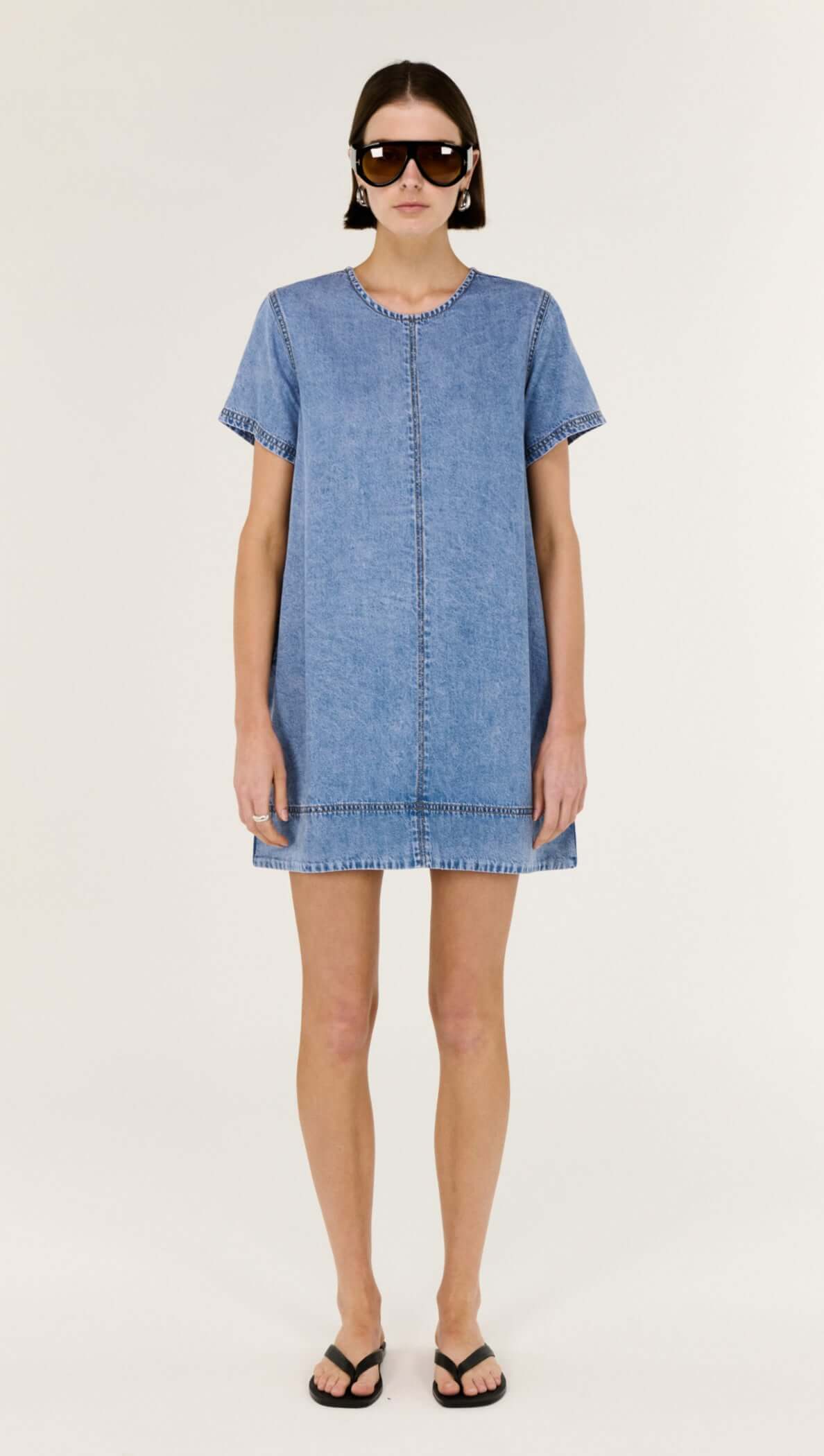 Chambray Lightweight Mini Dress featuring a relaxed A-line silhouette and clean panel detailing.
