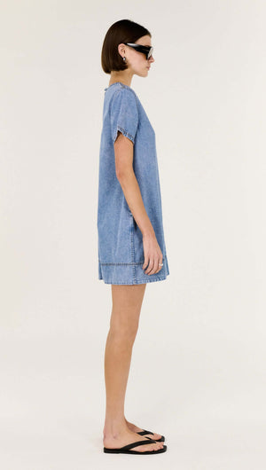 Chambray Lightweight Mini Dress displayed side view, featuring relaxed A-line silhouette and subtle back keyhole detail.